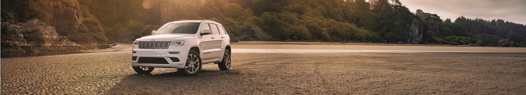 Jeep Grand Cherokee on the Beach Snipped